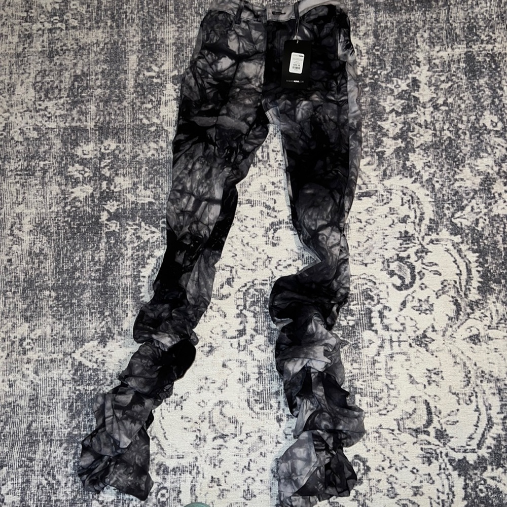 Fashion nova “lots in these words tie dye stacked pants”